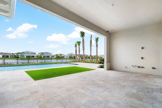 view of patio / terrace with a swimming pool