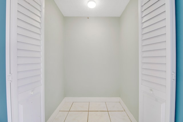 interior space featuring a textured ceiling