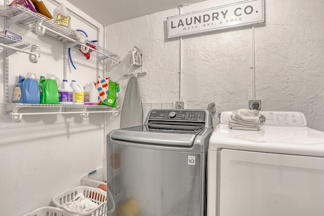 laundry area featuring independent washer and dryer