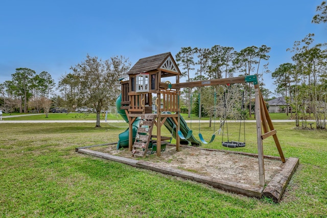 view of jungle gym with a lawn