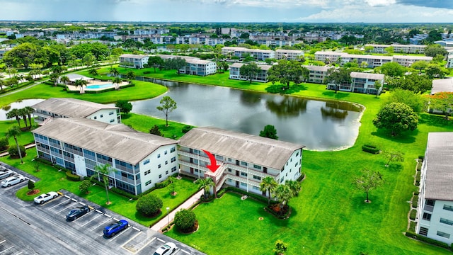 drone / aerial view with a water view