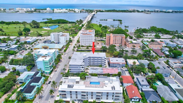 birds eye view of property featuring a water view