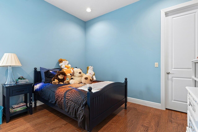 bedroom featuring wood-type flooring