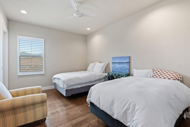 bedroom featuring ceiling fan and wood-type flooring