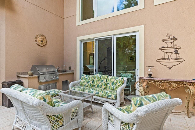 view of patio / terrace with area for grilling and an outdoor kitchen