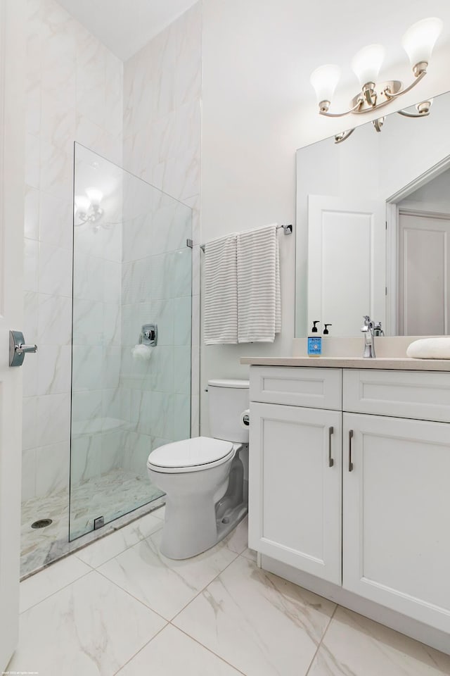 bathroom with tile patterned flooring, toilet, vanity, and an enclosed shower