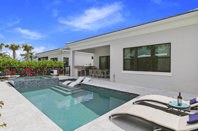 13173 Faberge Pl, Palm Beach Gardens, FL 33418 - view of pool with area for grilling, a patio, and a pool with connected hot tub
