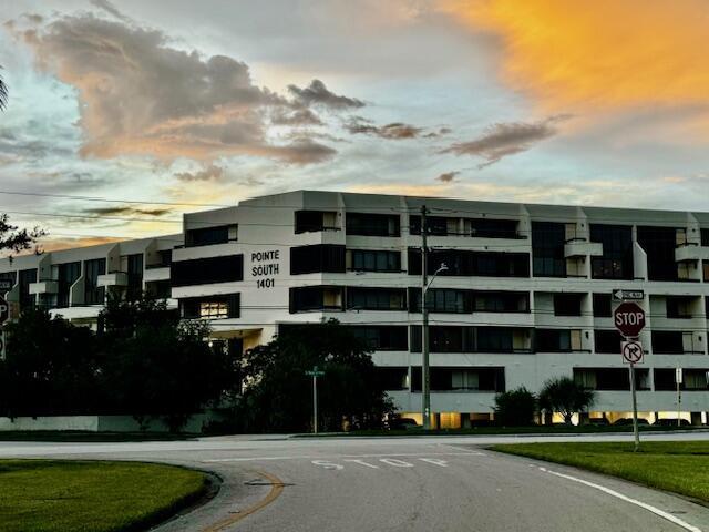 view of outdoor building at dusk