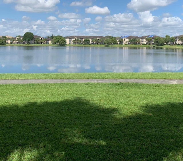 view of property view of water