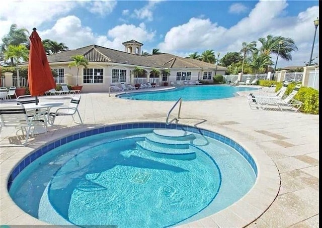 view of pool with a patio area