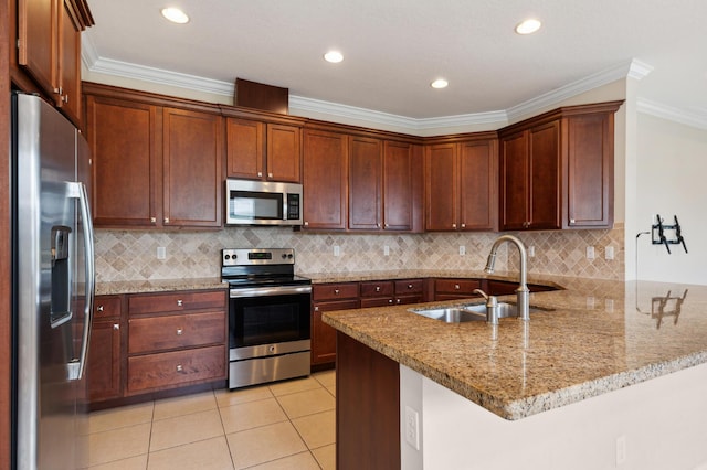 kitchen with kitchen peninsula, appliances with stainless steel finishes, crown molding, sink, and light tile patterned flooring