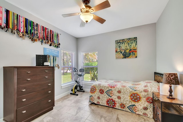 bedroom featuring ceiling fan