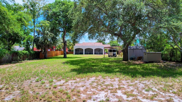 view of yard with a storage shed