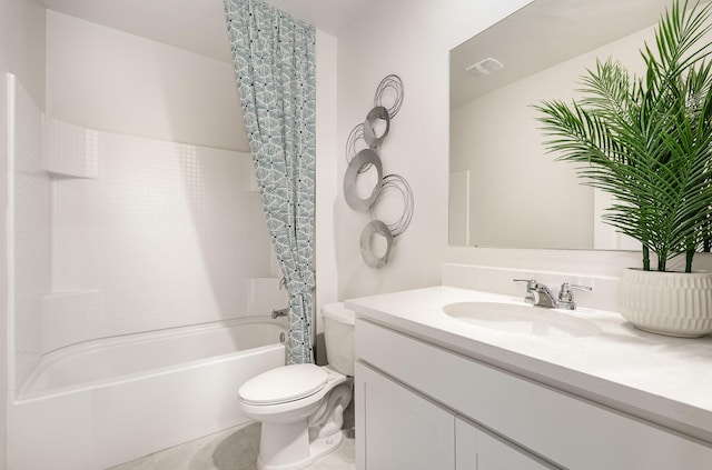 full bathroom featuring tile patterned floors, vanity, toilet, and shower / bath combo