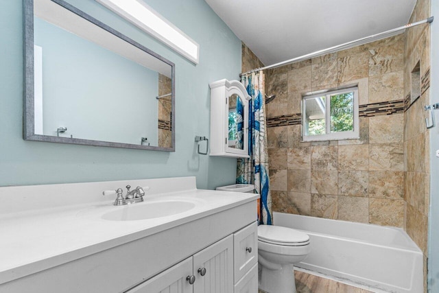 full bathroom featuring shower / bathtub combination with curtain, toilet, vanity, and hardwood / wood-style flooring