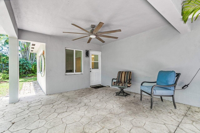 view of patio / terrace featuring ceiling fan