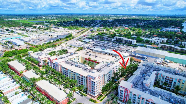 birds eye view of property with a view of city