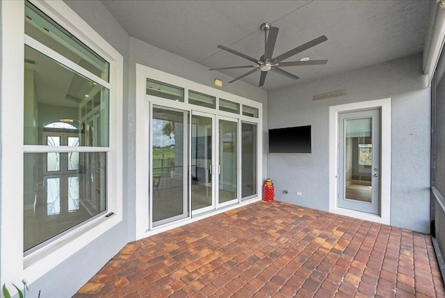 view of patio with a ceiling fan