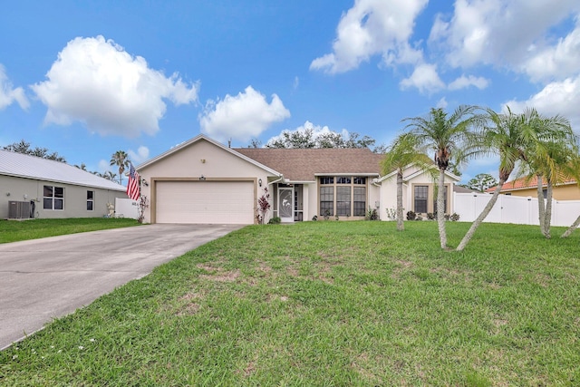 ranch-style home featuring a front yard, central AC unit, and a garage