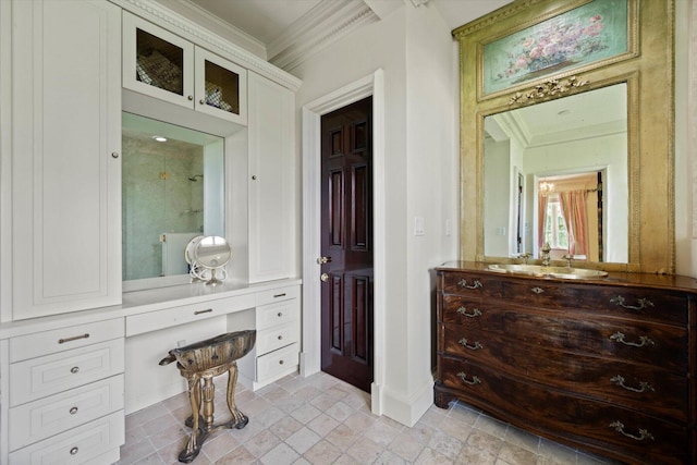 full bathroom featuring baseboards, ornamental molding, a shower, and vanity