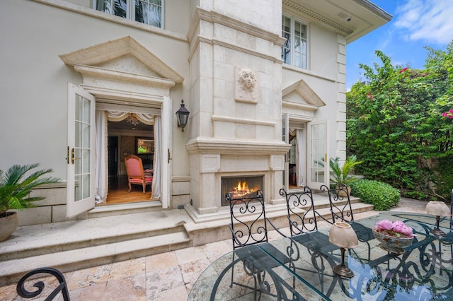 view of patio / terrace with a premium fireplace