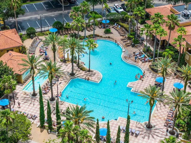 community pool with a patio