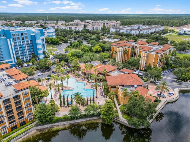 birds eye view of property featuring a water view