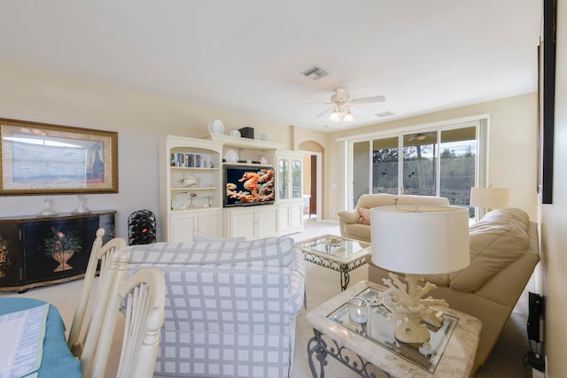 living room featuring ceiling fan