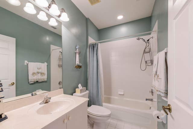 full bathroom with shower / tub combo with curtain, toilet, vanity, and tile patterned floors