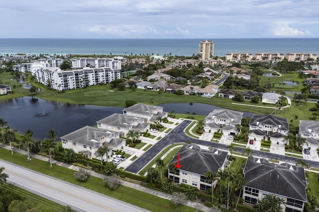 aerial view featuring a water view and a residential view