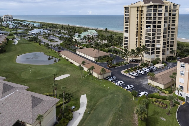 aerial view with view of golf course and a water view