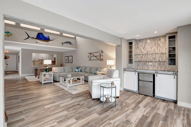 living room with light hardwood / wood-style floors