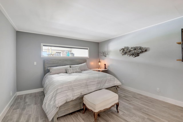 bedroom featuring hardwood / wood-style flooring