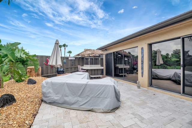 view of patio / terrace featuring a jacuzzi