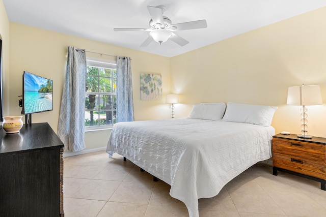 bedroom with light tile patterned flooring and ceiling fan