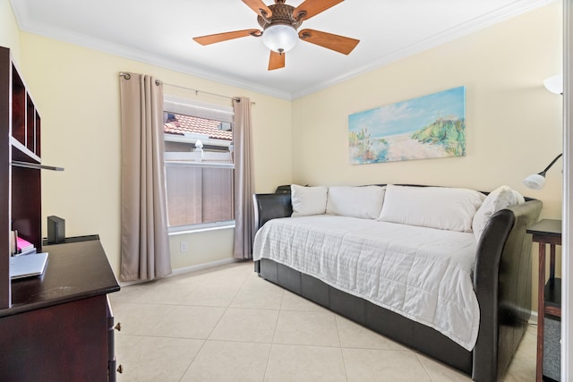 tiled bedroom with ornamental molding and ceiling fan