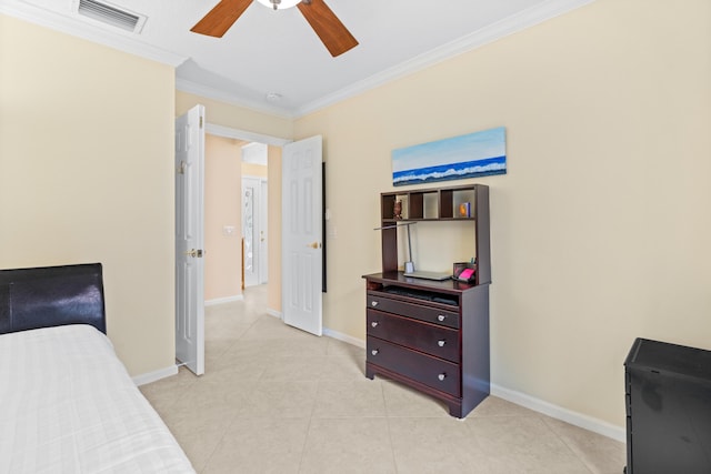 bedroom with ceiling fan, ornamental molding, and light tile patterned floors