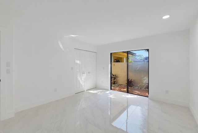 empty room featuring tile flooring