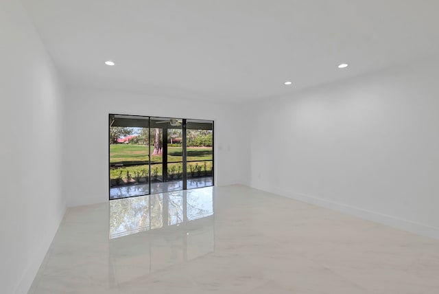 spare room featuring light tile floors