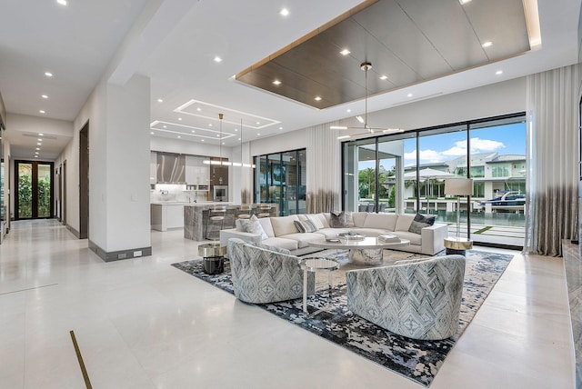 living room featuring recessed lighting and baseboards