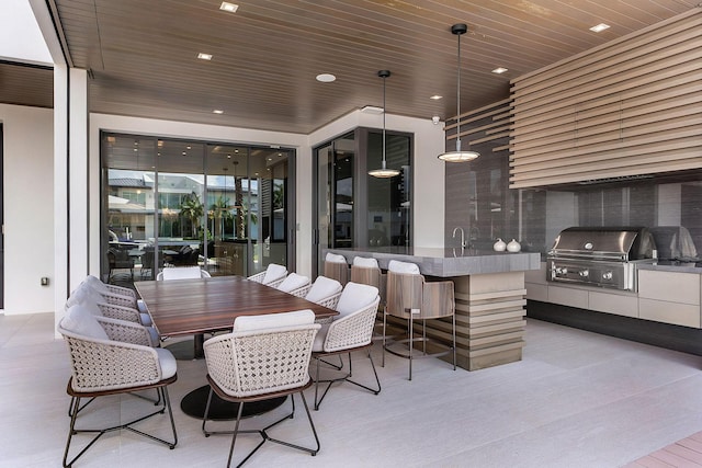 dining room with wooden ceiling and recessed lighting