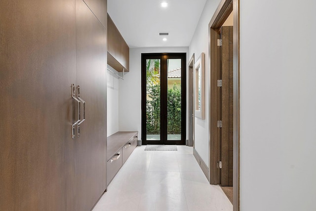 mudroom with french doors and visible vents