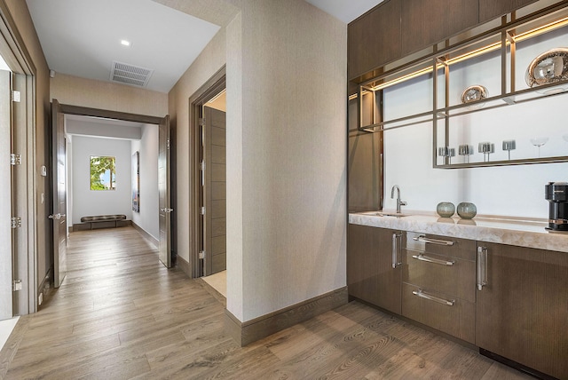 hall with sink and dark hardwood / wood-style floors