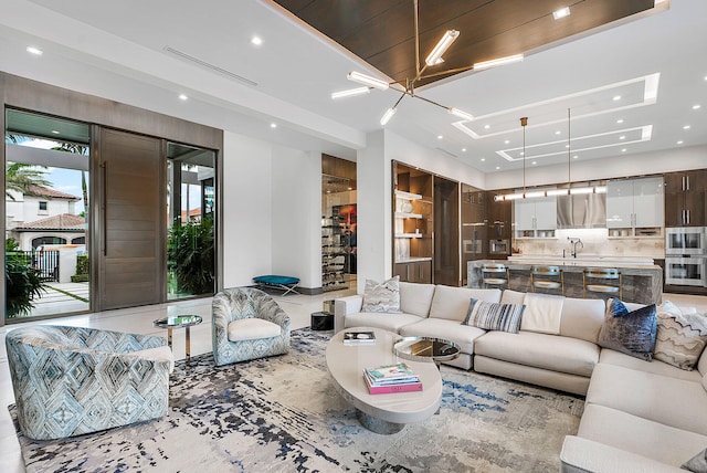 living room featuring a chandelier