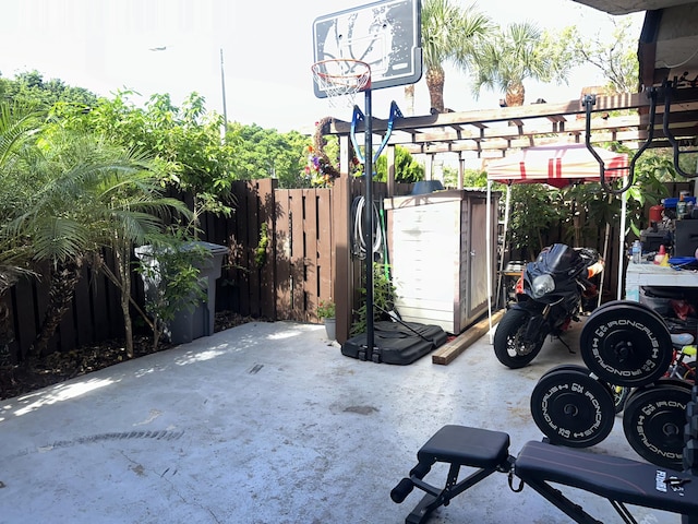 view of patio with fence