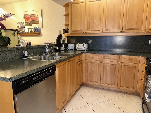 kitchen featuring stainless steel dishwasher, a sink, dark countertops, light tile patterned floors, and open shelves