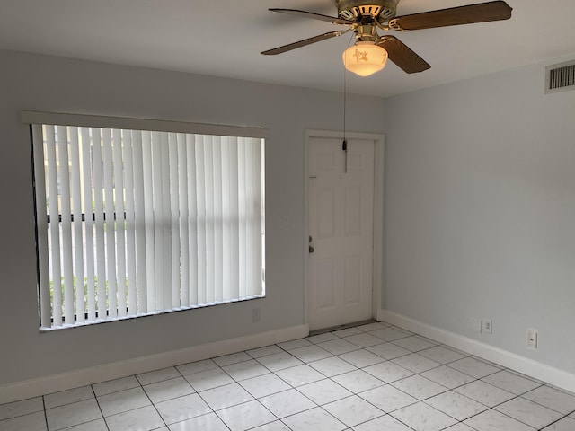 spare room featuring ceiling fan