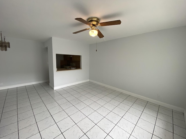 unfurnished room featuring ceiling fan