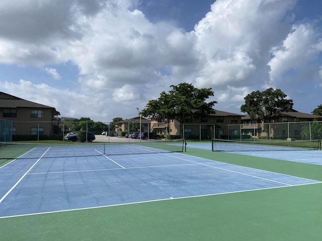 view of sport court featuring basketball hoop