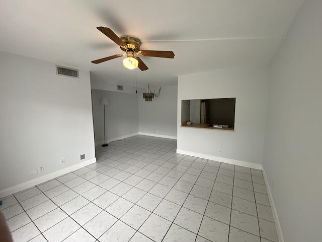 unfurnished room with ceiling fan